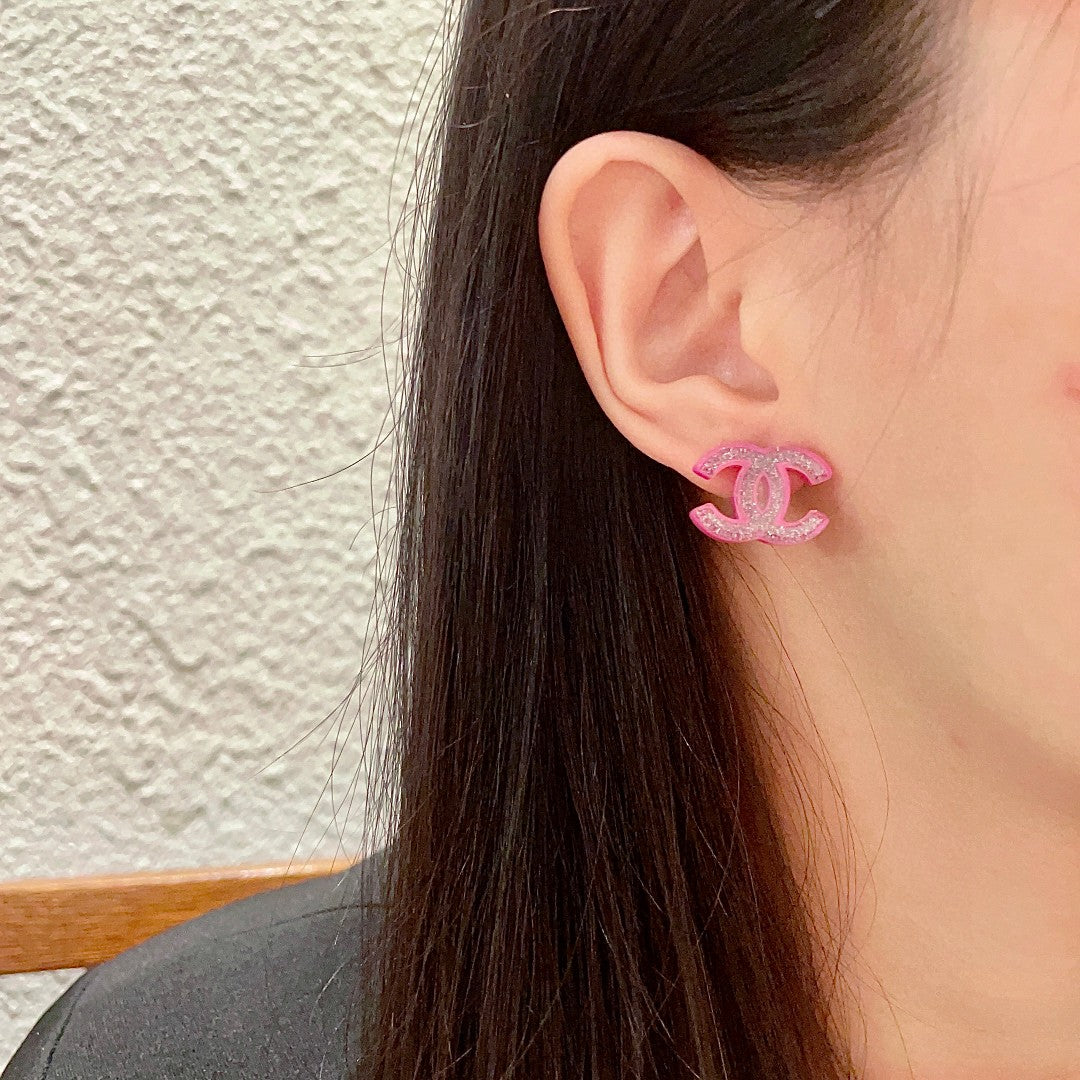 Double-C Emblem Stud Earrings in Polished Metal-Tone – Design 191 detail view