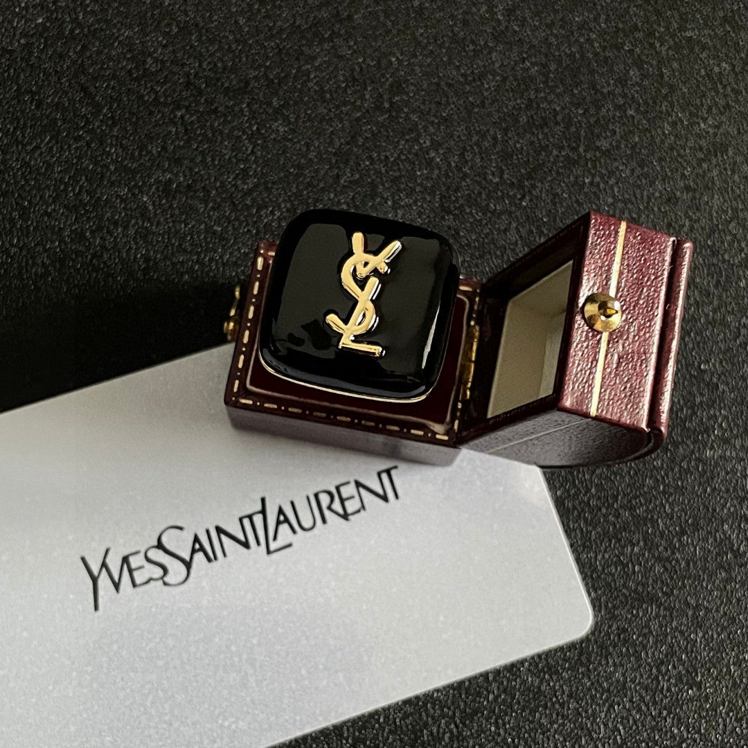 Letter Emblem Statement Ring in Polished Metal-Tone detail view