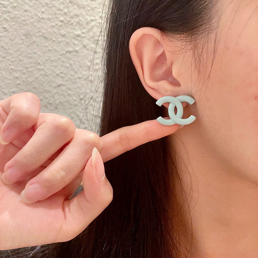 Double-C Emblem Stud Earrings in Polished Metal-Tone – Design 156 front product view
