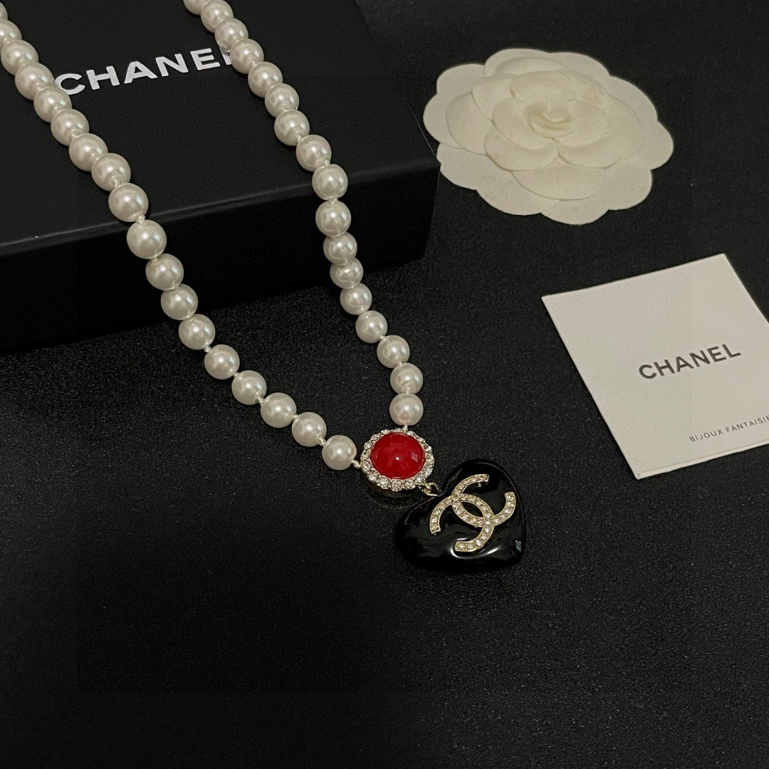 Double-C Emblem Crystal-Accent Pendant Necklace – Heart Detail – Design 002 styled product view