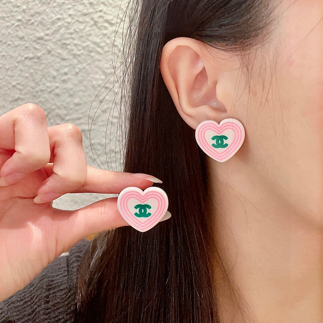 Double-C Emblem Stud Earrings in Polished Metal-Tone – Heart Detail – Design 004 main product view