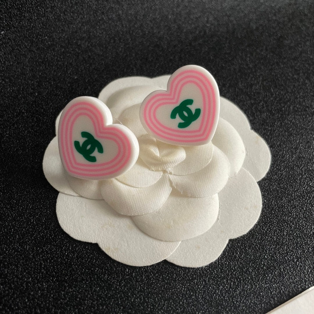 Double-C Emblem Stud Earrings in Polished Metal-Tone – Heart Detail – Design 004 front product view