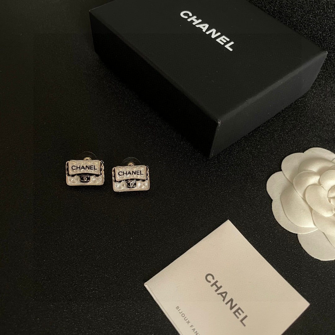 Double-C Emblem Stud Earrings in Polished Metal-Tone – Design 152 close-up detail