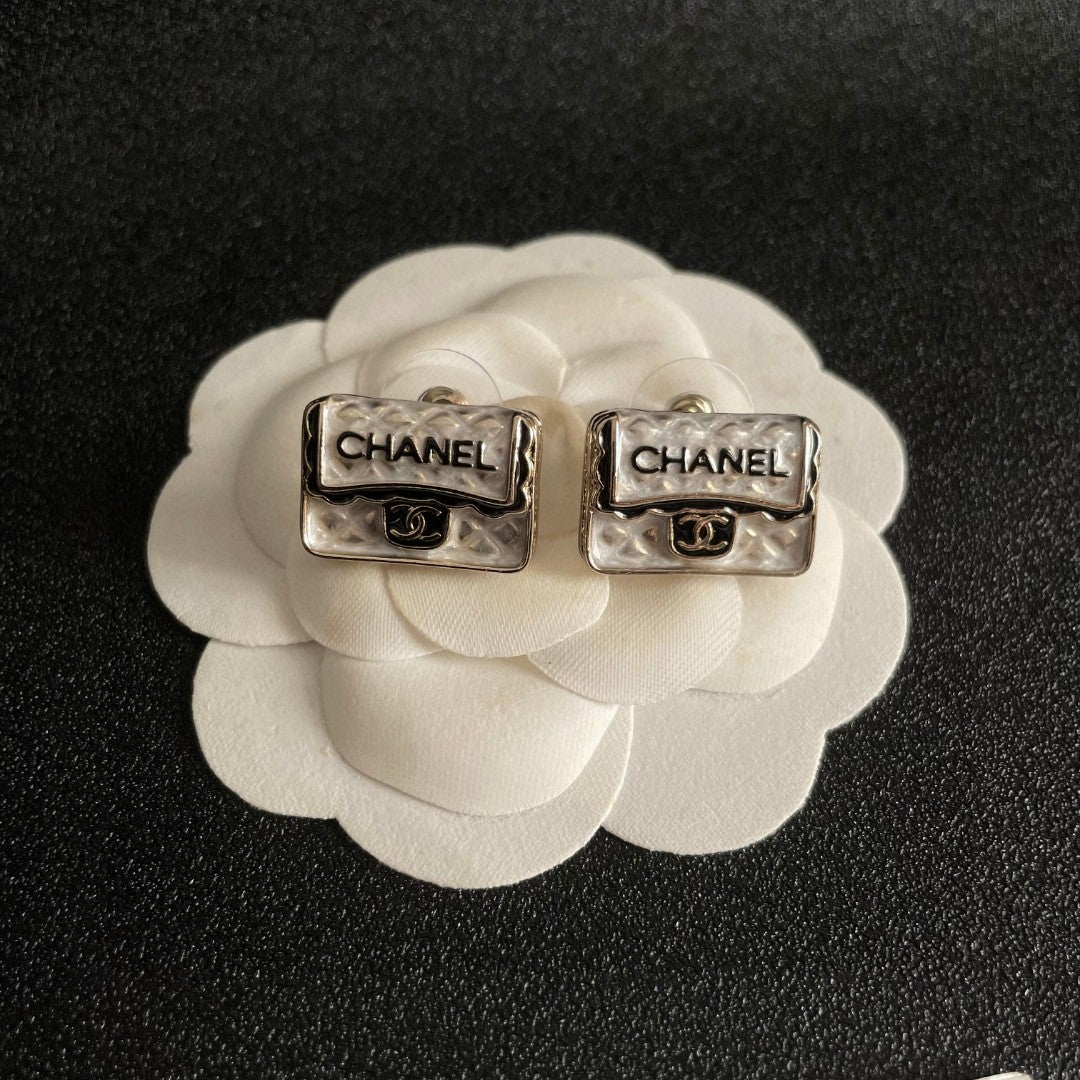 Double-C Emblem Stud Earrings in Polished Metal-Tone – Design 152 front product view