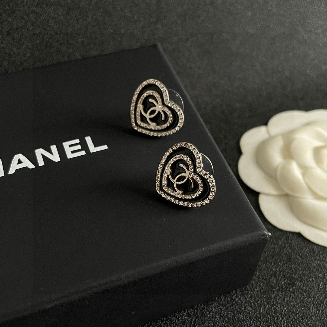 Double-C Emblem Crystal-Accent Stud Earrings – Heart Detail detail view