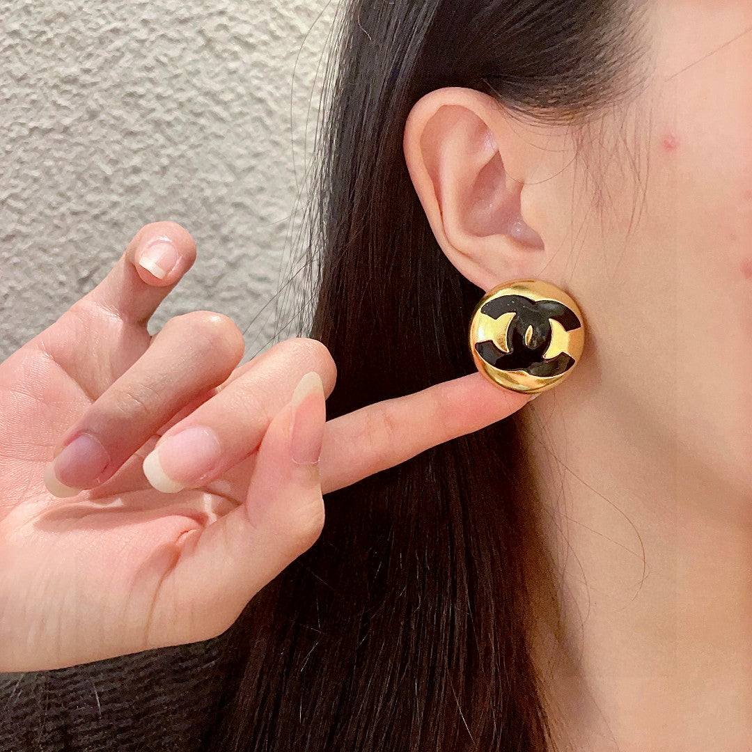 Double-C Emblem Stud Earrings in Polished Metal-Tone – Design 147 front product view