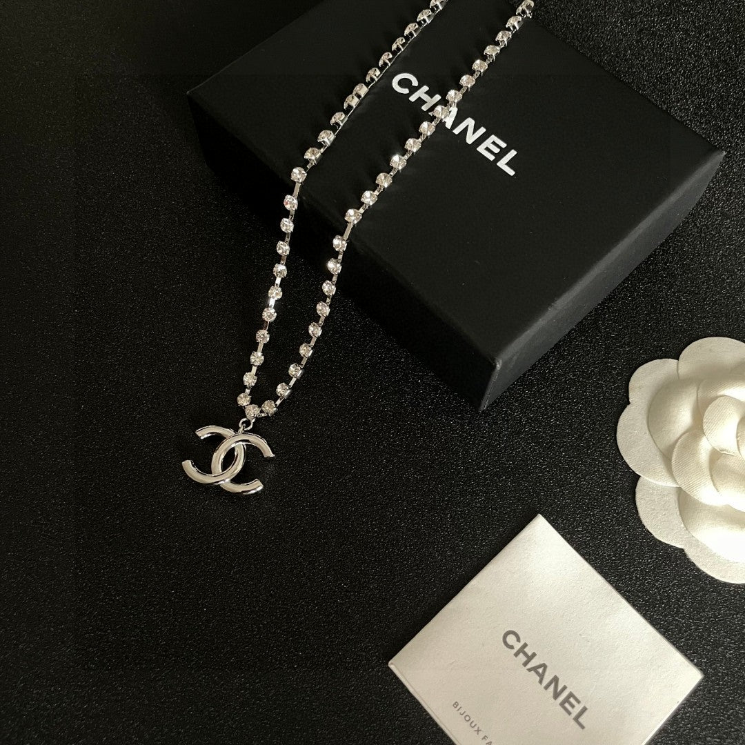 Double-C Emblem Pendant Necklace in Polished Metal-Tone – Design 011 close-up detail