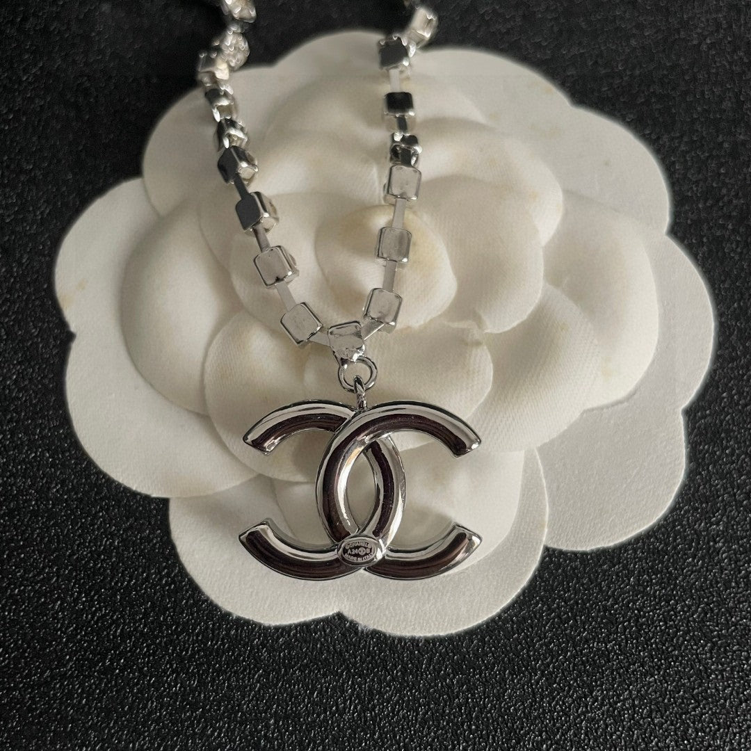 Double-C Emblem Pendant Necklace in Polished Metal-Tone – Design 011 front product view