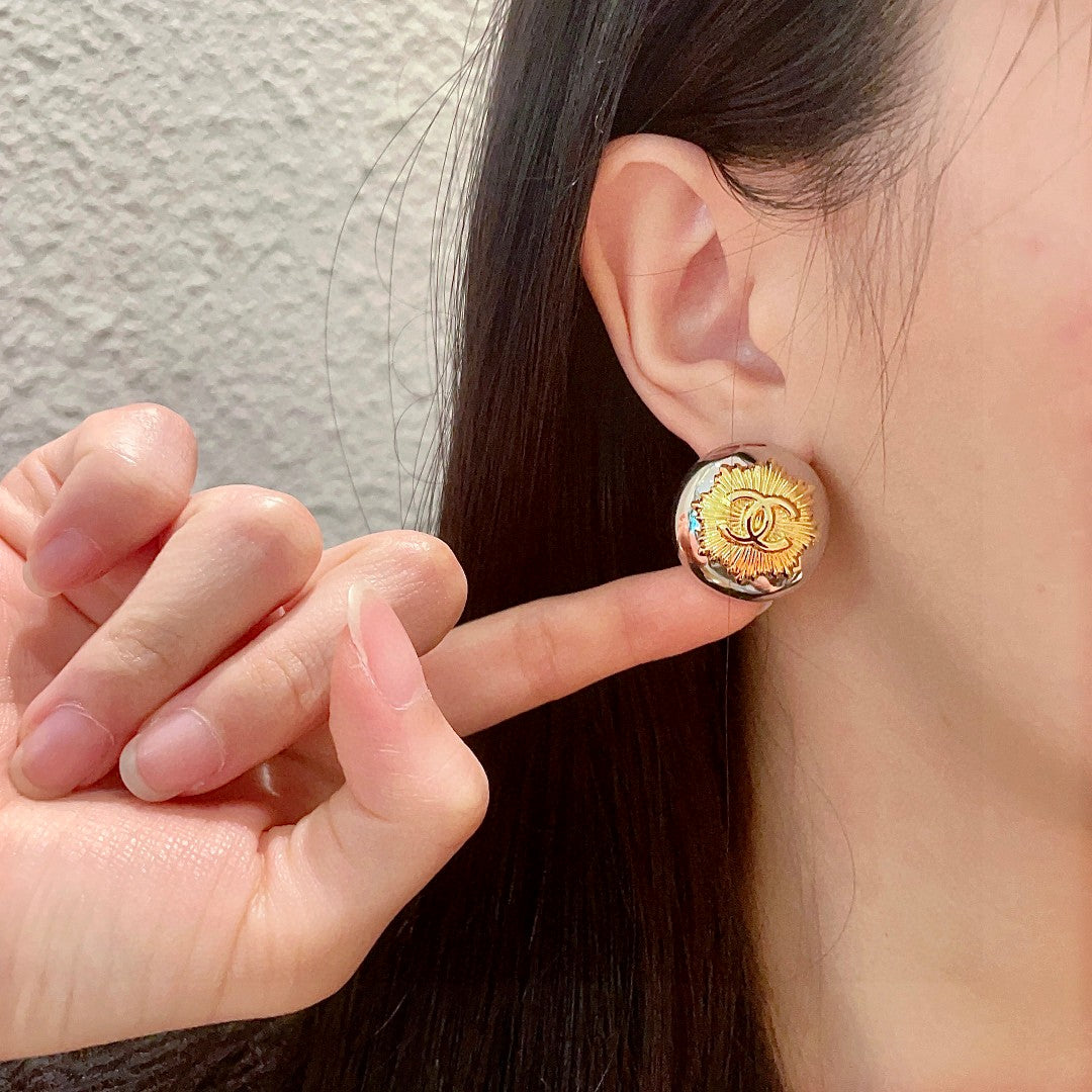 Double-C Emblem Stud Earrings in Polished Metal-Tone – Design 045 front product view