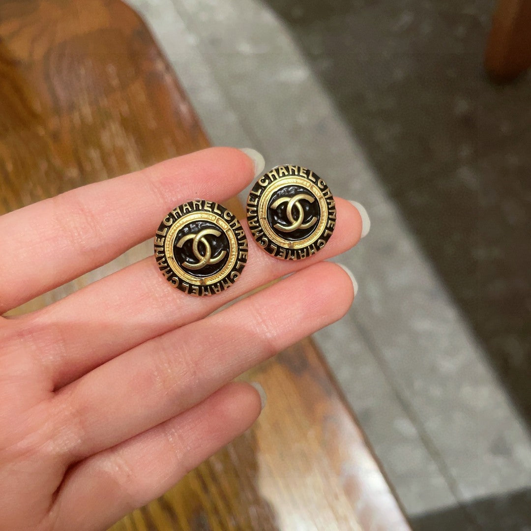 Double-C Emblem Stud Earrings in Polished Metal-Tone – Design 144 side detail