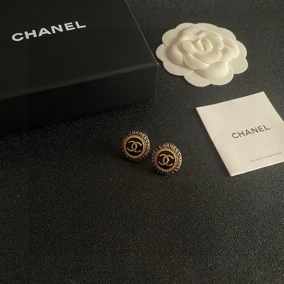 Double-C Emblem Stud Earrings in Polished Metal-Tone – Design 144 styled product view