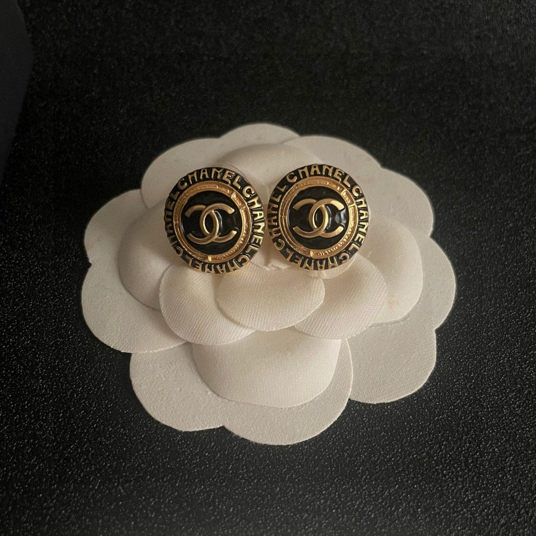 Double-C Emblem Stud Earrings in Polished Metal-Tone – Design 144 front product view