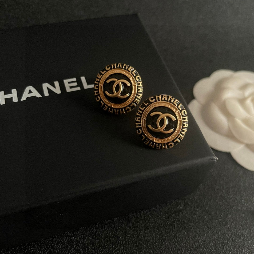 Double-C Emblem Stud Earrings in Polished Metal-Tone – Design 144 detail view