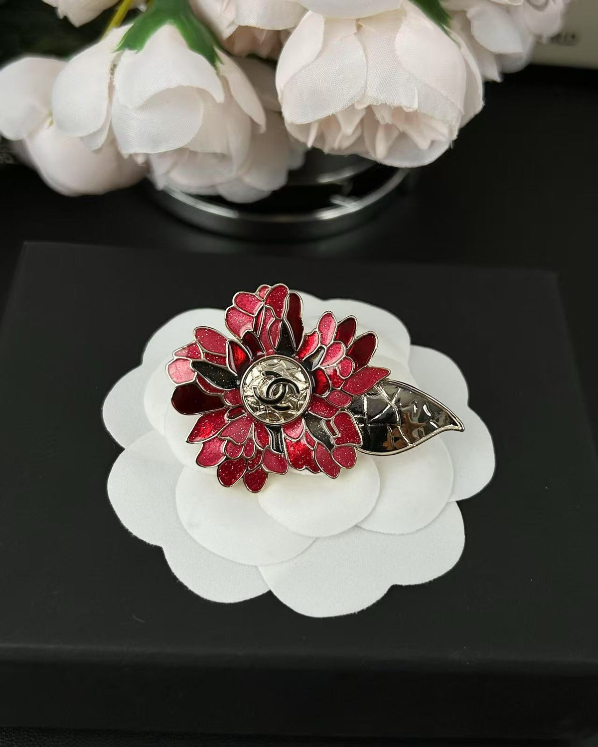 Signature Emblem Brooch in Polished Metal-Tone – Red Detail – Design 002 close-up detail