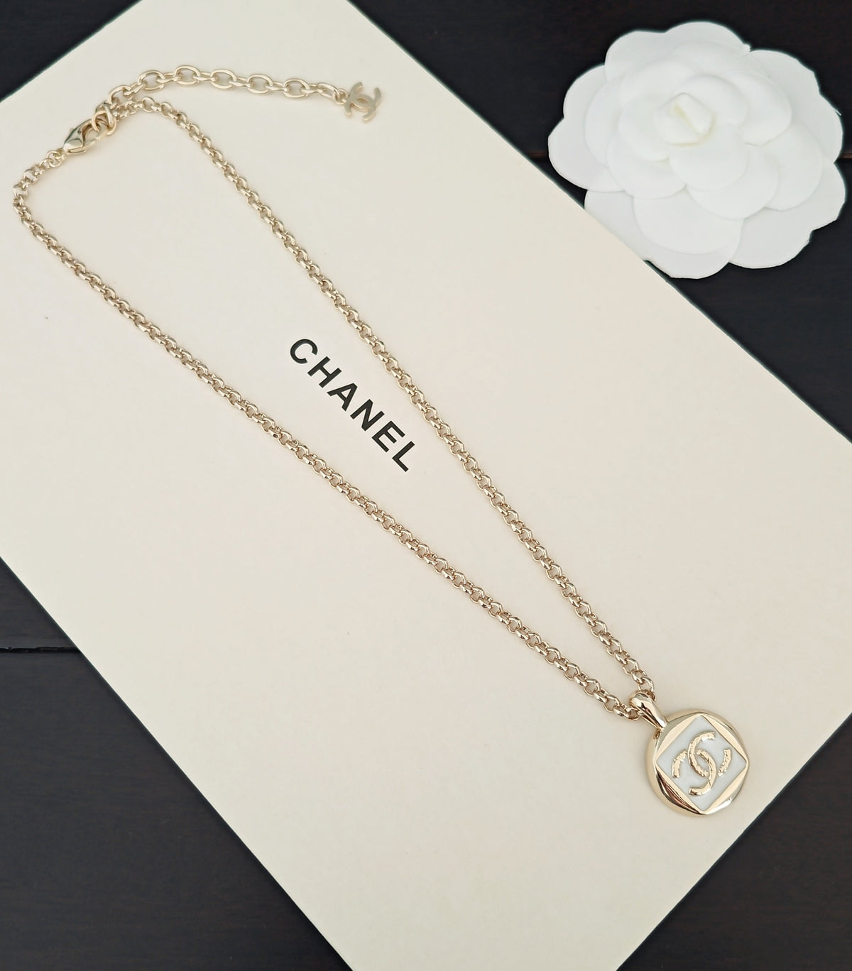 Signature Emblem Pendant Necklace in Gold-Tone – White Detail – Design 005 close-up detail