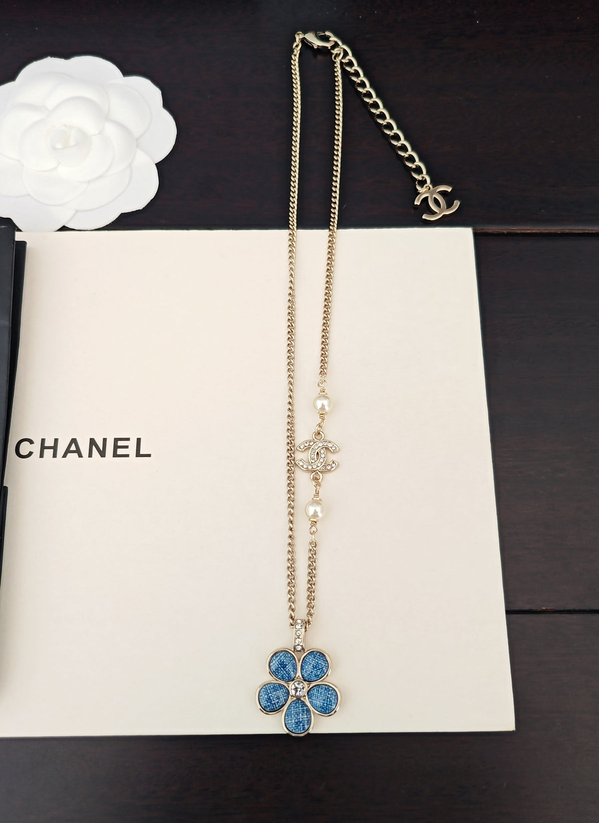 Signature Emblem Crystal-Accent Pendant Necklace – Blue Detail side detail