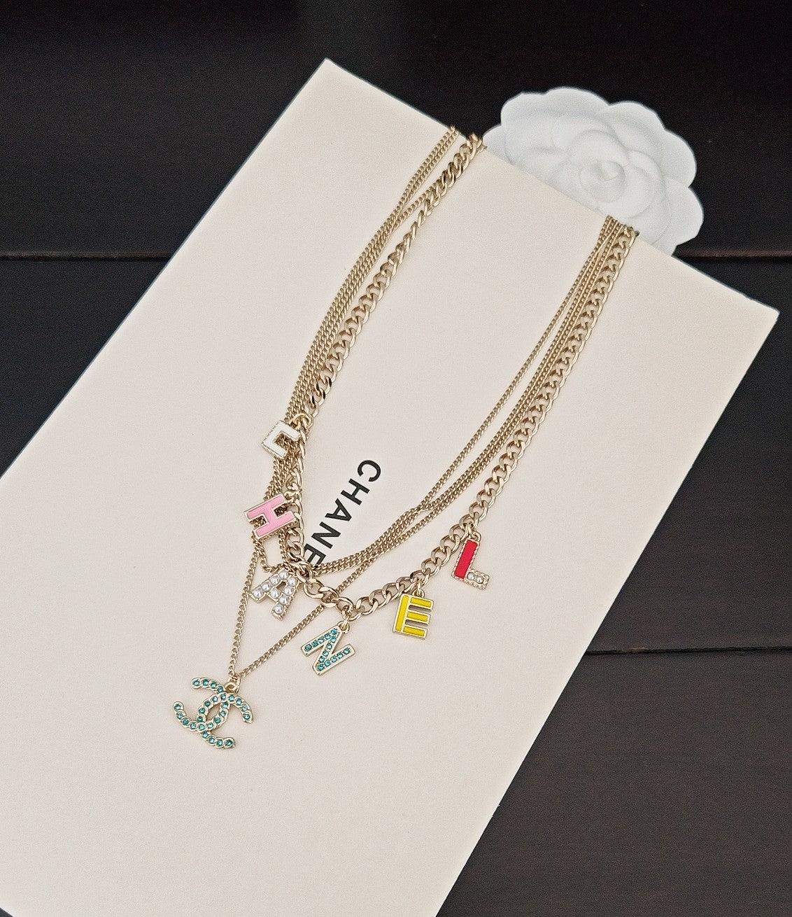 Letter Pendant Necklace in Gold-Tone – Blue Detail close-up detail