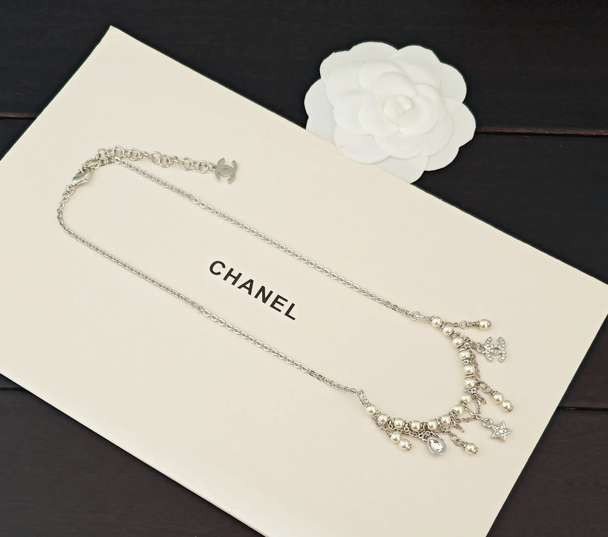 Signature Emblem Pendant Necklace in Gold-Tone – White Detail styled product view
