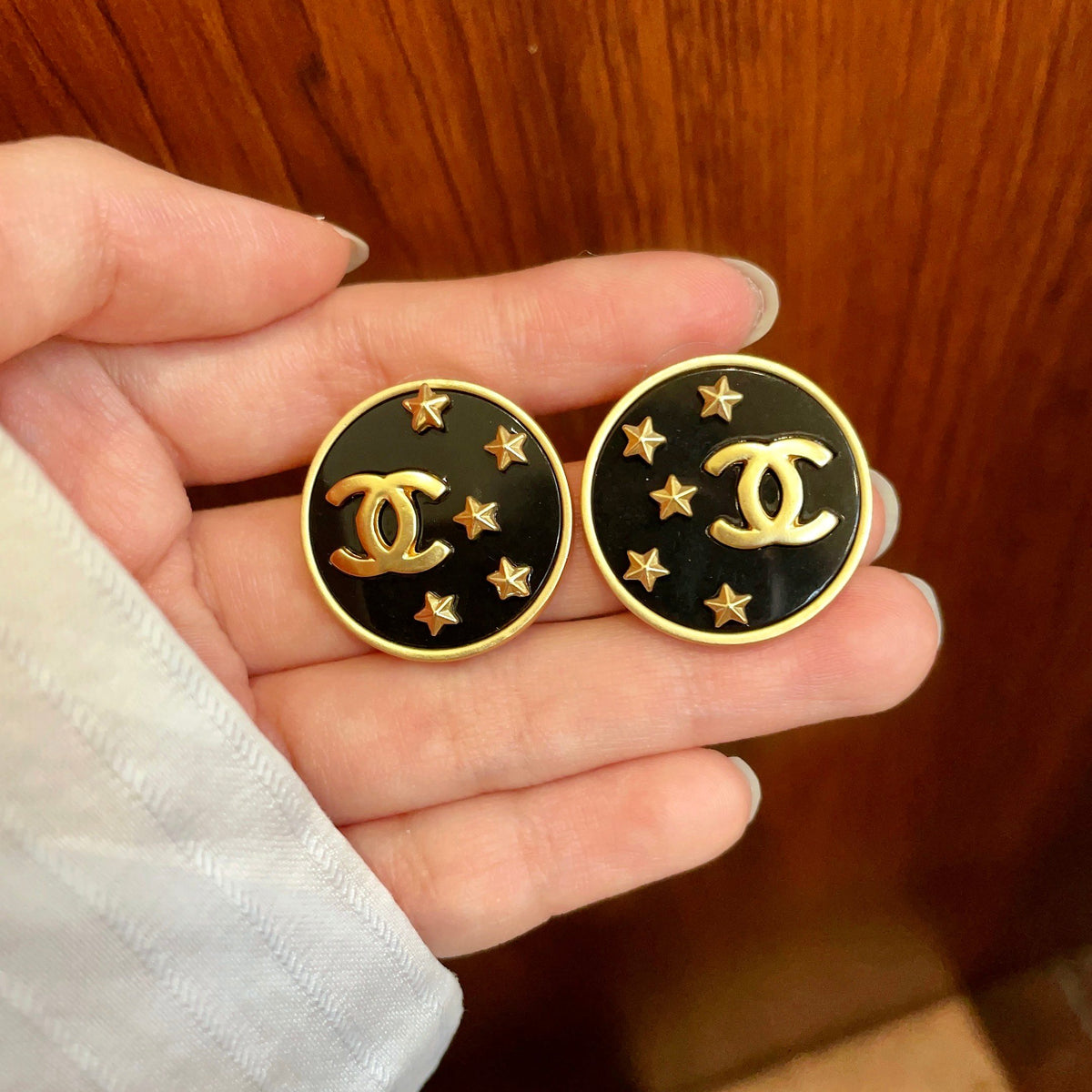 Double-C Emblem Stud Earrings in Polished Metal-Tone – Star Detail – Design 015 side detail