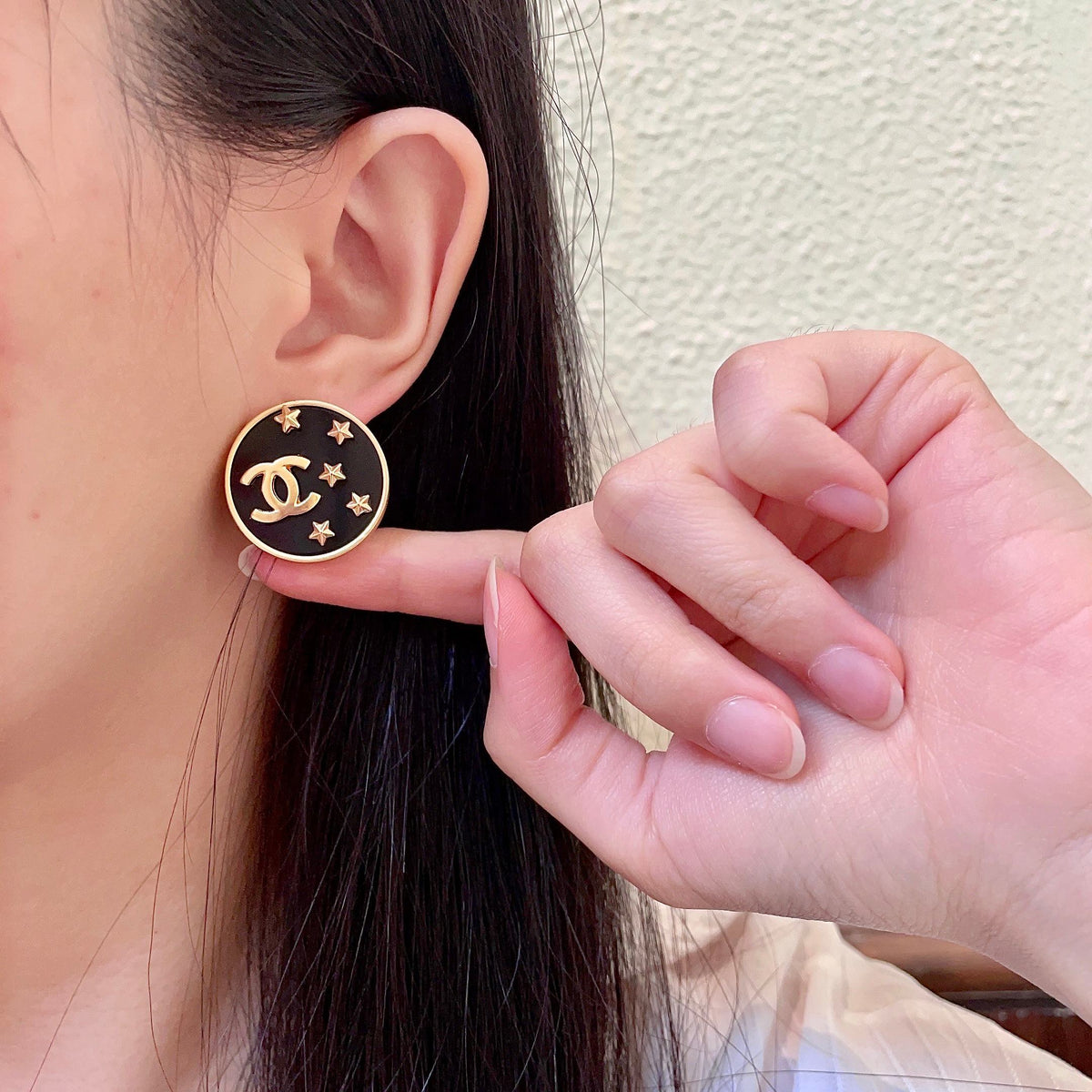 Double-C Emblem Stud Earrings in Polished Metal-Tone – Star Detail – Design 015 front product view