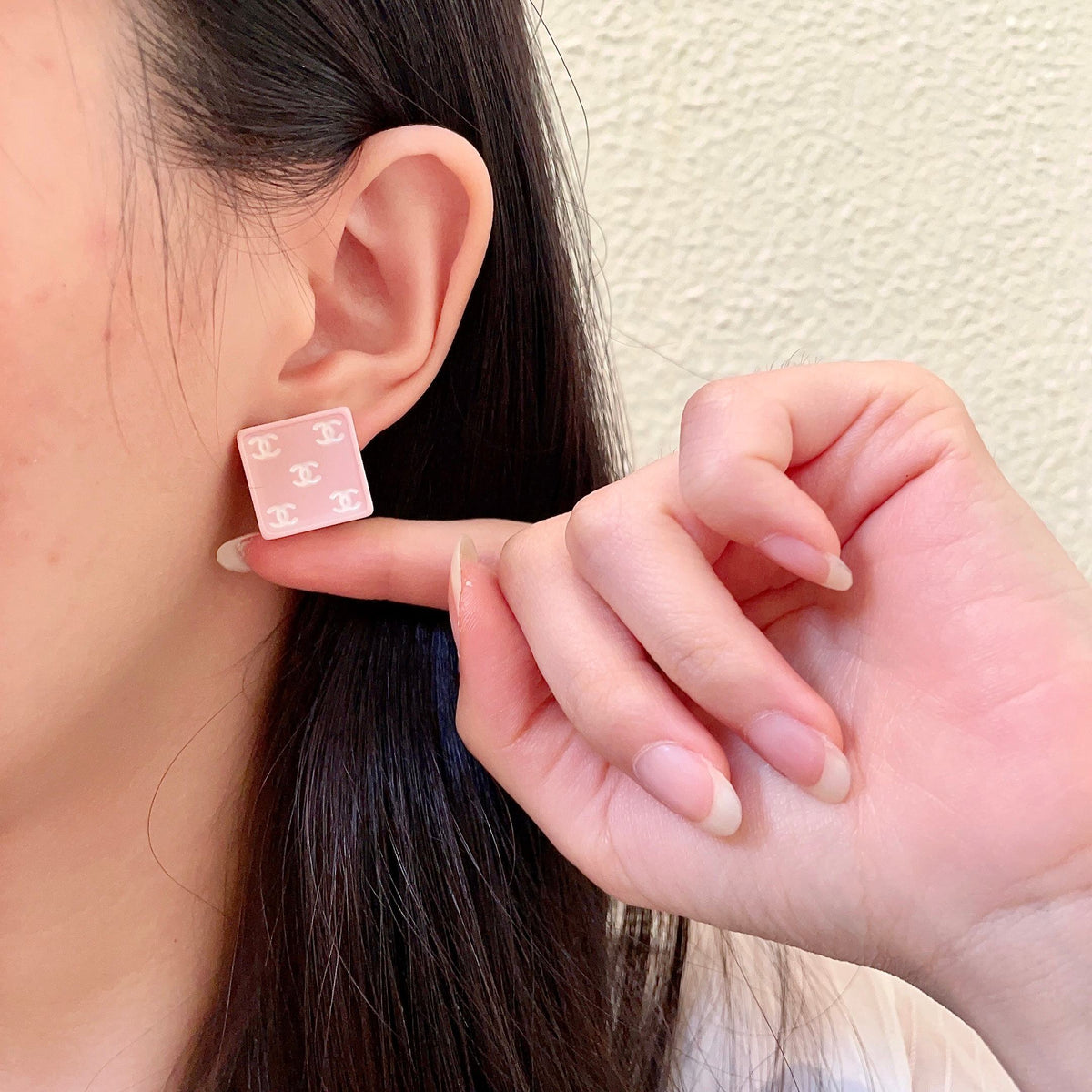 Double-C Emblem Stud Earrings in Polished Metal-Tone – Design 229 front product view