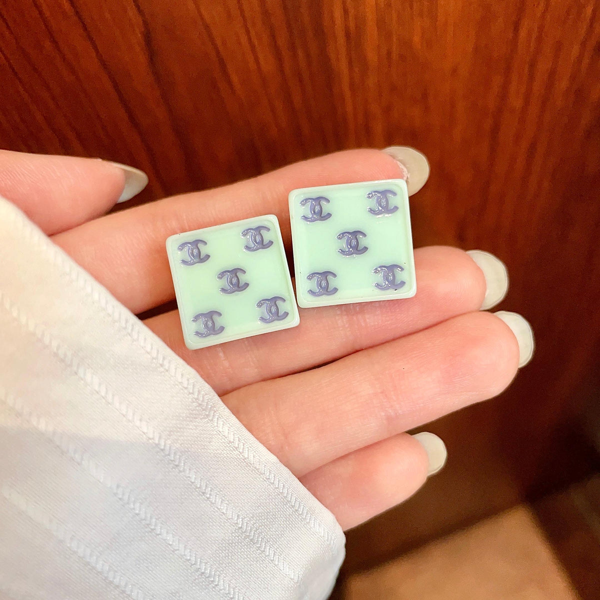 Double-C Emblem Stud Earrings in Polished Metal-Tone – Design 230 side detail