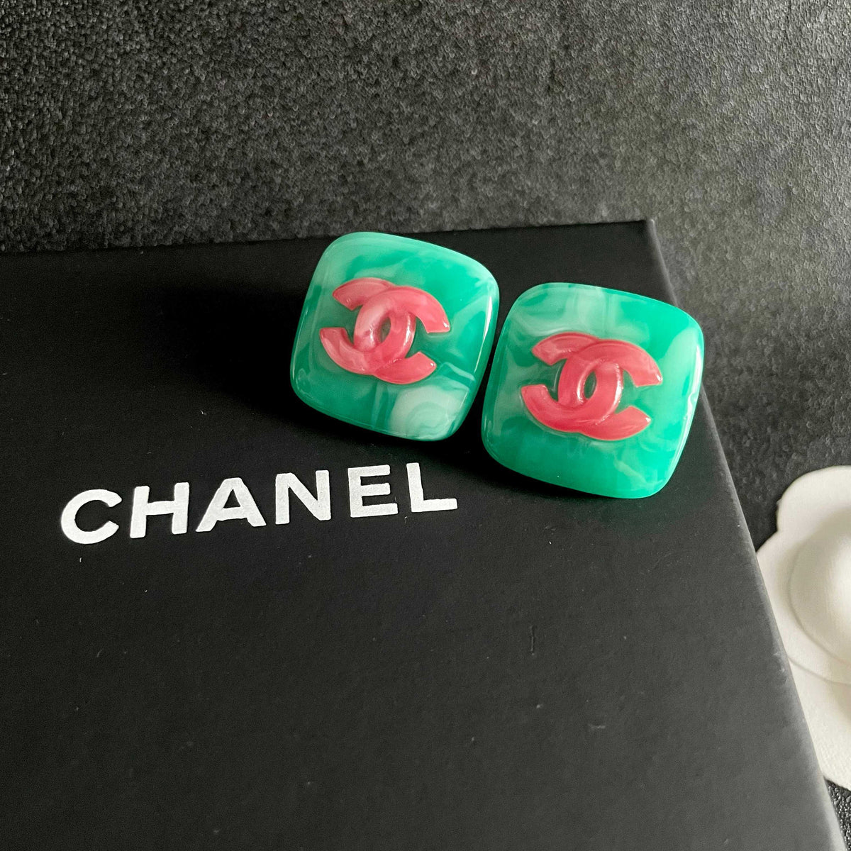 Double-C Emblem Stud Earrings in Polished Metal-Tone – Design 022 detail view