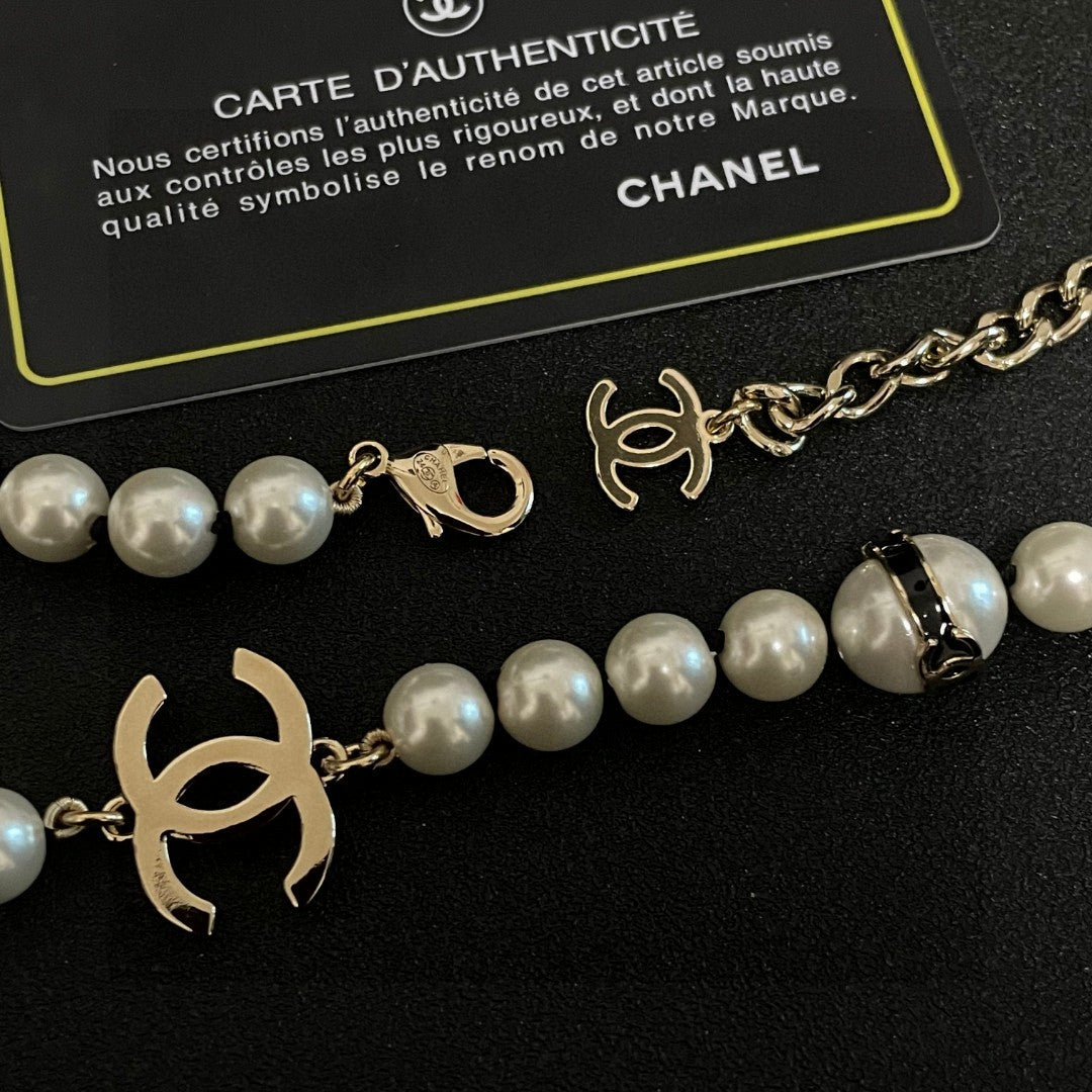 Double-C Emblem Pearl-Detail Pendant Necklace – Pearl Detail – Design 100 front product view