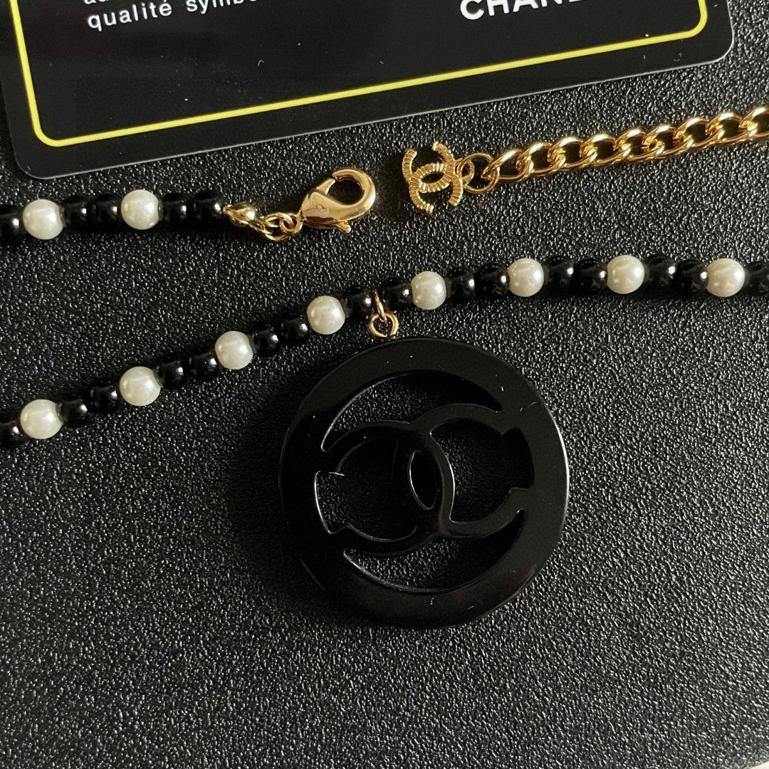 Double-C Emblem Pearl-Detail Pendant Necklace – Pearl Detail – Design 099 main product view
