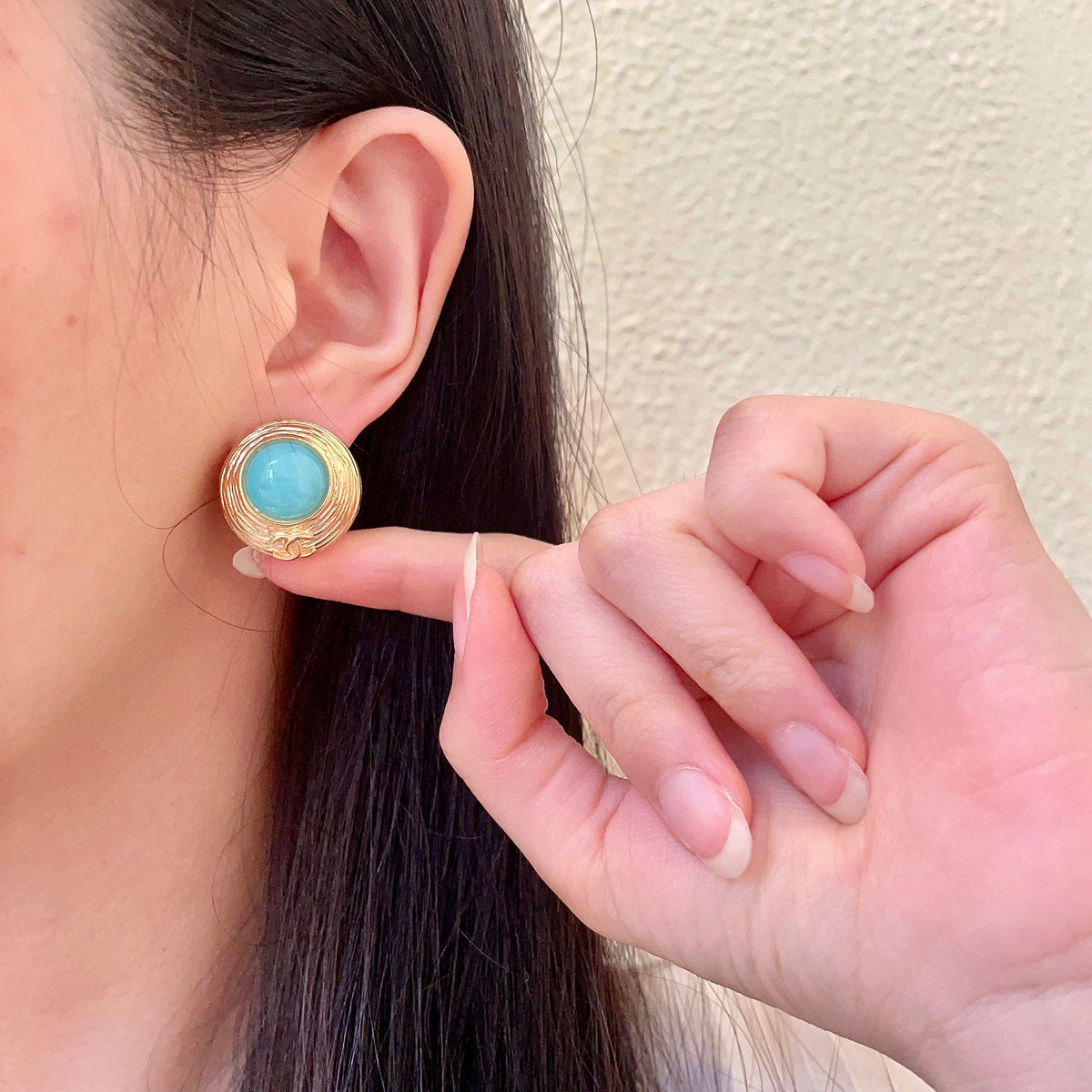 Double-C Emblem Stud Earrings in Polished Metal-Tone – Design 280 front product view