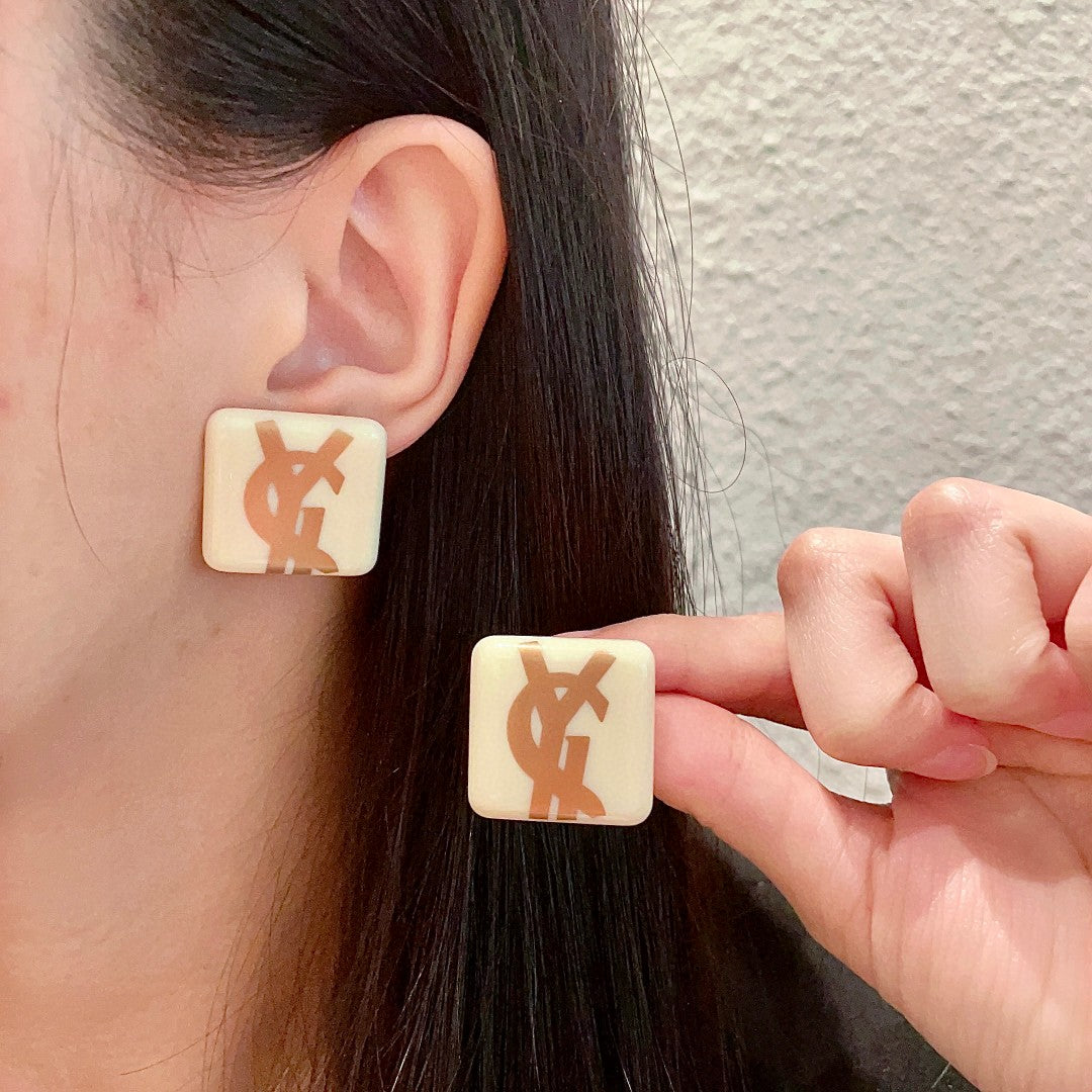 Letter Emblem Stud Earrings in Polished Metal-Tone – Design 018 main product view