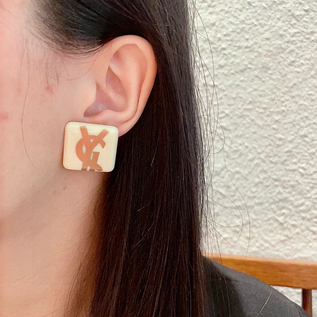 Letter Emblem Stud Earrings in Polished Metal-Tone – Design 018 detail view