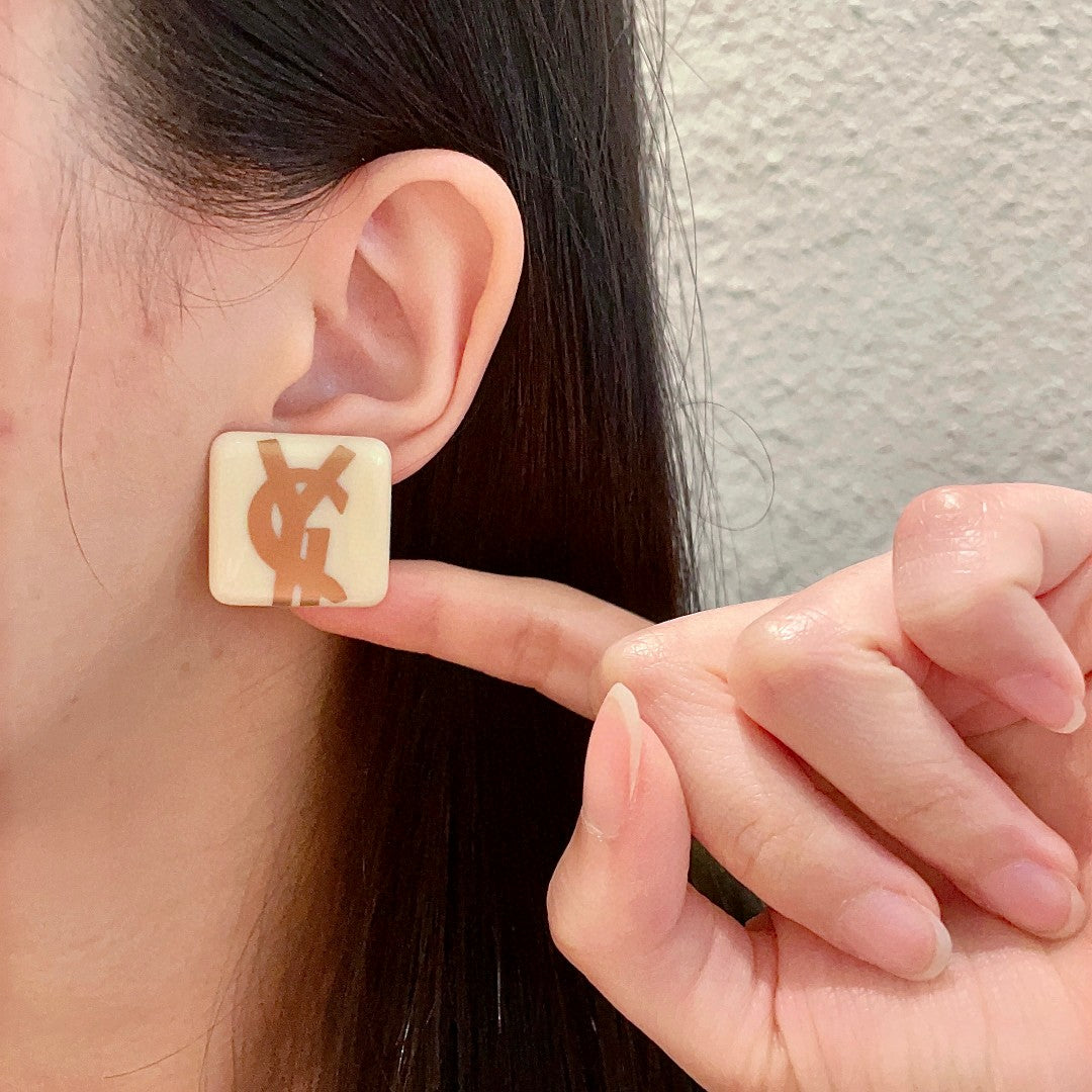 Letter Emblem Stud Earrings in Polished Metal-Tone – Design 018 front product view