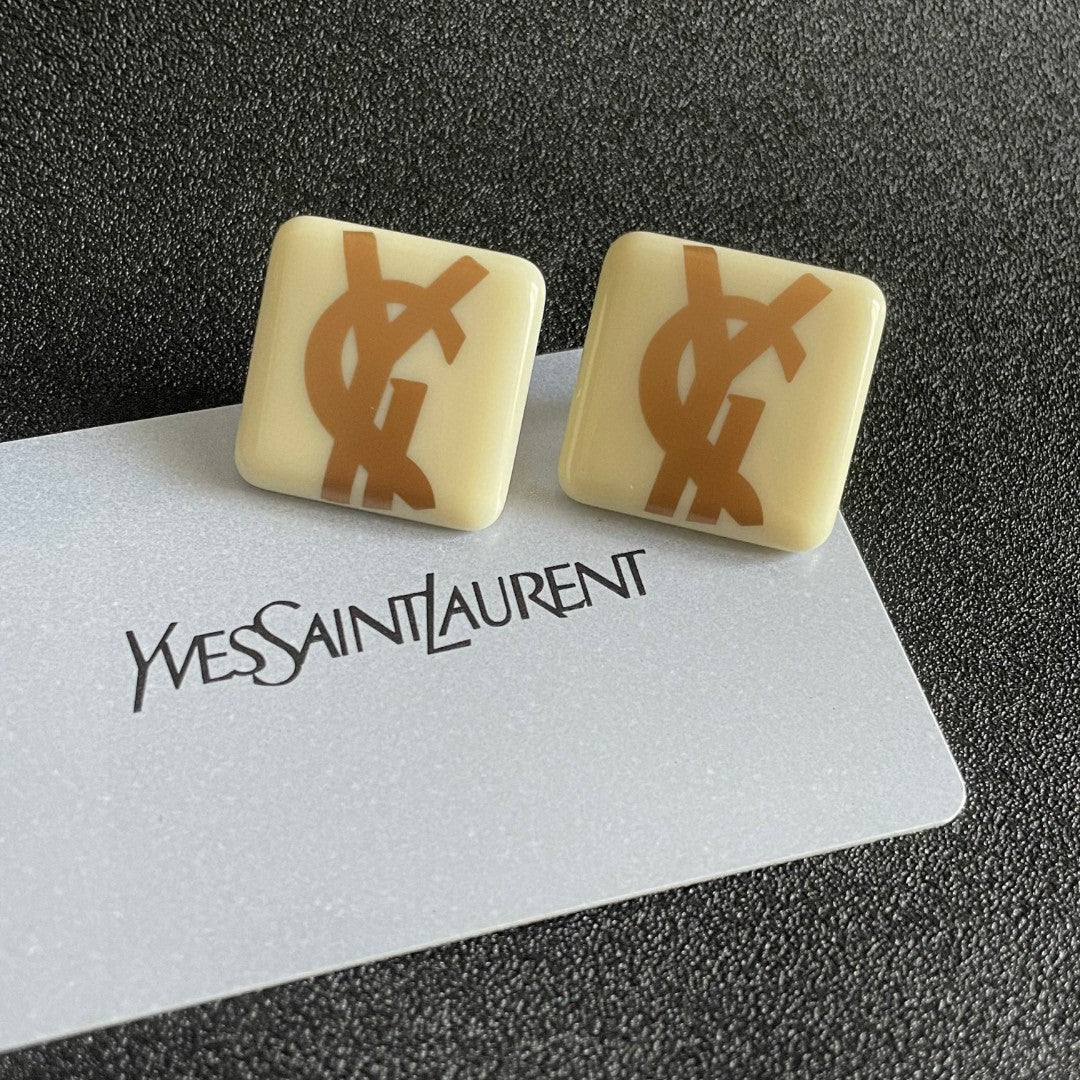 Letter Emblem Stud Earrings in Polished Metal-Tone – Design 004 front product view