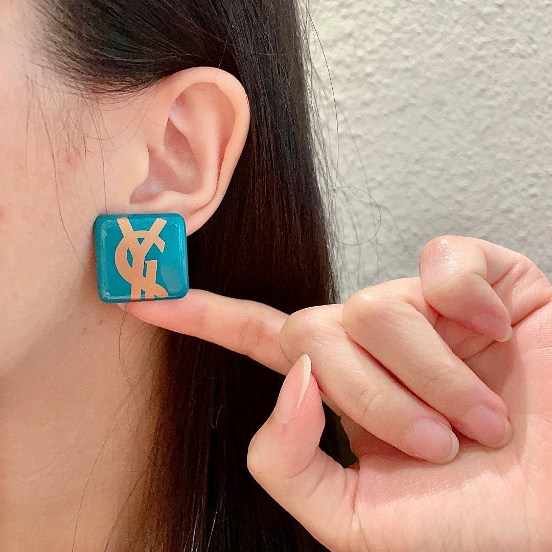 Letter Emblem Stud Earrings in Polished Metal-Tone – Design 013 front product view