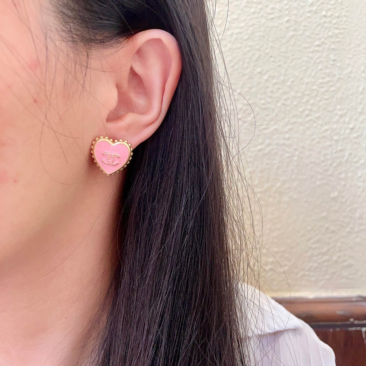 Double-C Emblem Stud Earrings in Polished Metal-Tone – Heart Detail – Design 011 detail view