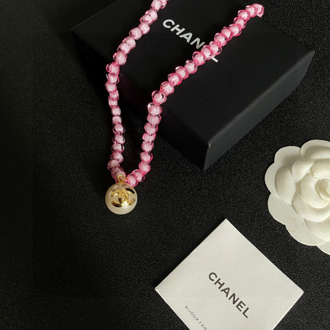 Double-C Emblem Pearl-Detail Pendant Necklace – Pearl Detail – Design 087 close-up detail