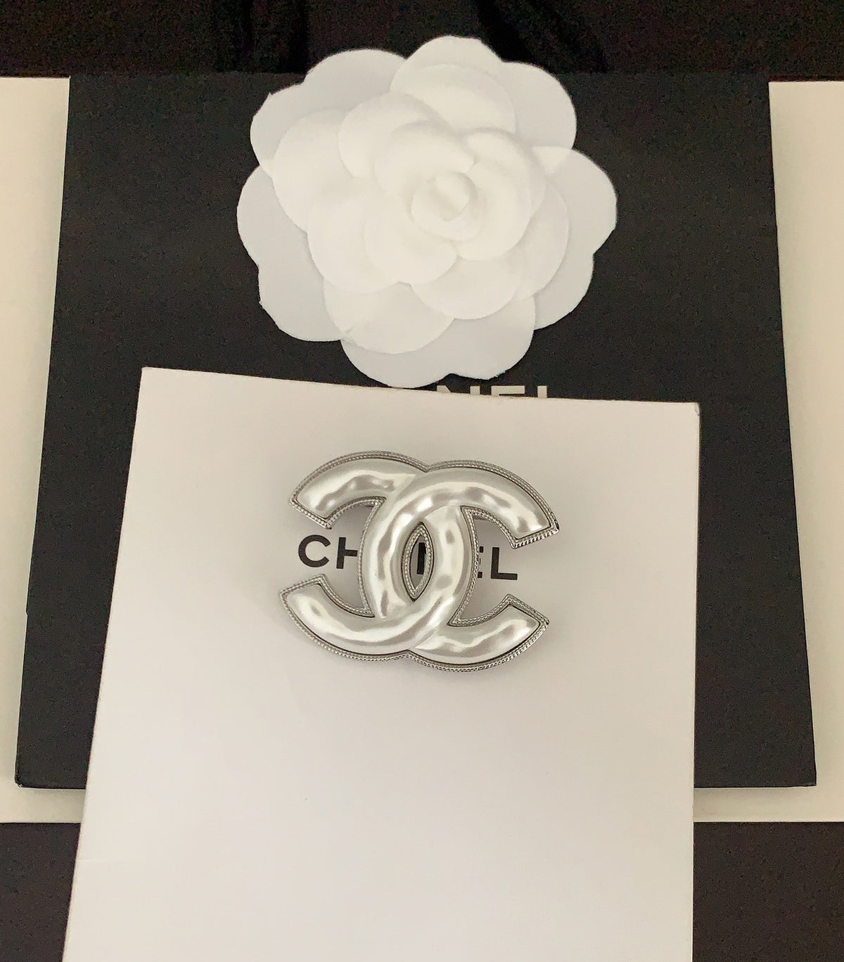 Signature Emblem Brooch in Gold-Tone – White Detail side detail