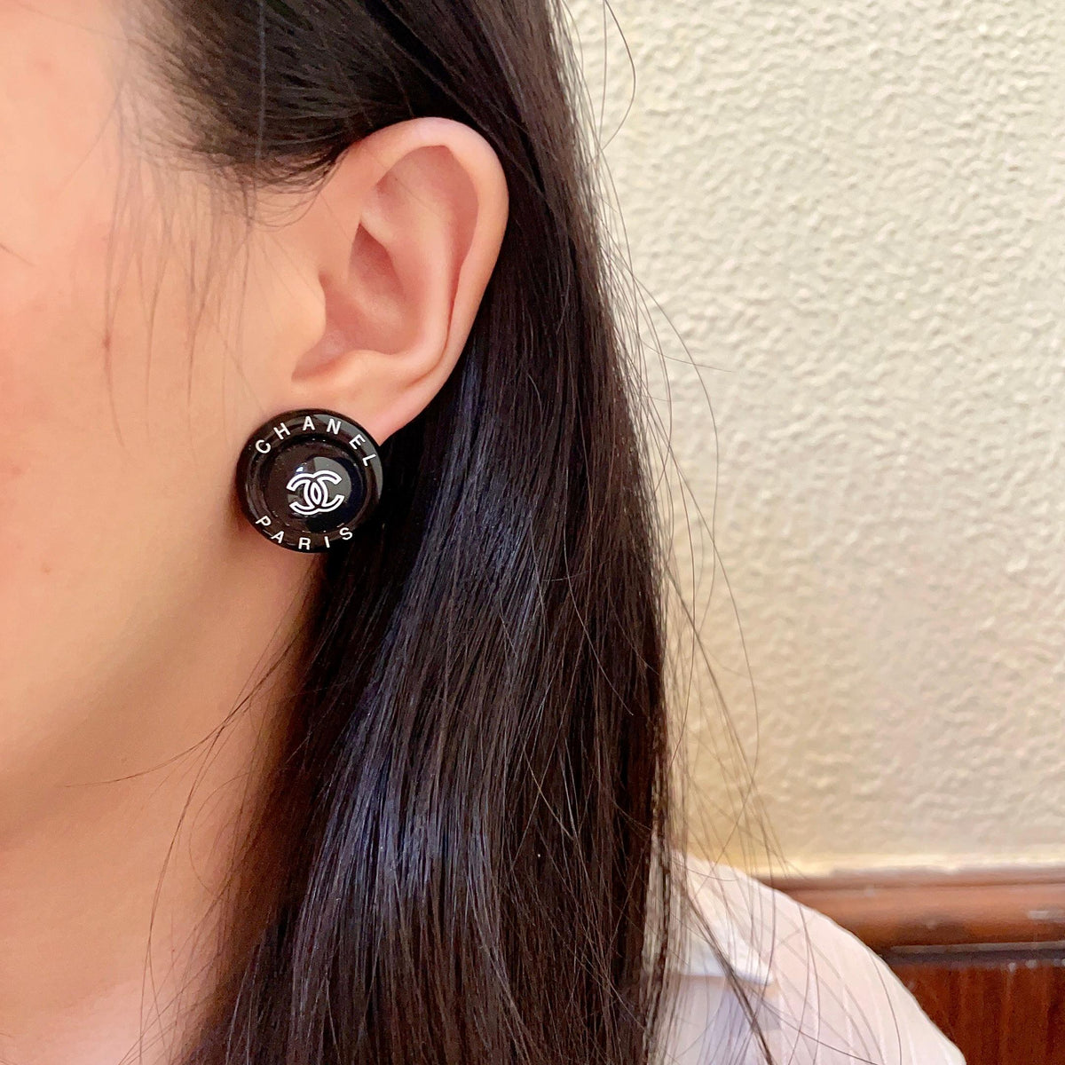 Double-C Emblem Stud Earrings in Polished Metal-Tone – Design 174 detail view