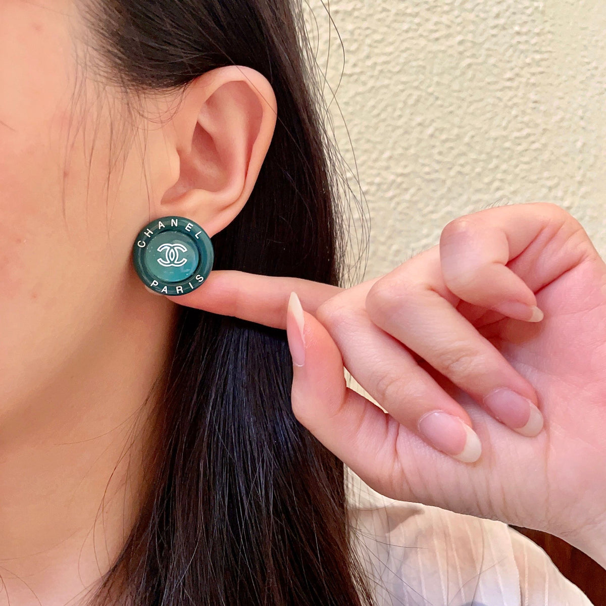 Double-C Emblem Stud Earrings in Polished Metal-Tone – Design 173 front product view