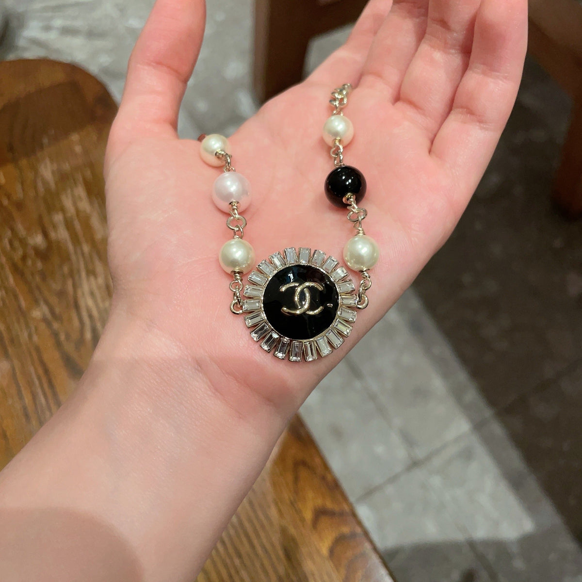 Double-C Emblem Pearl-Detail Pendant Necklace – Pearl Detail – Design 105 side detail