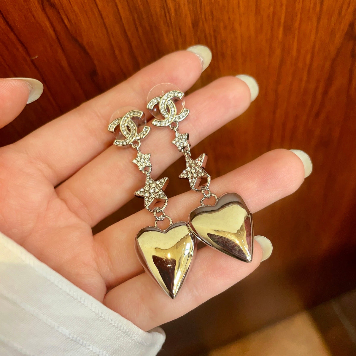 Double-C Emblem Statement Earrings in Polished Metal-Tone – Heart Detail – Design 002 side detail