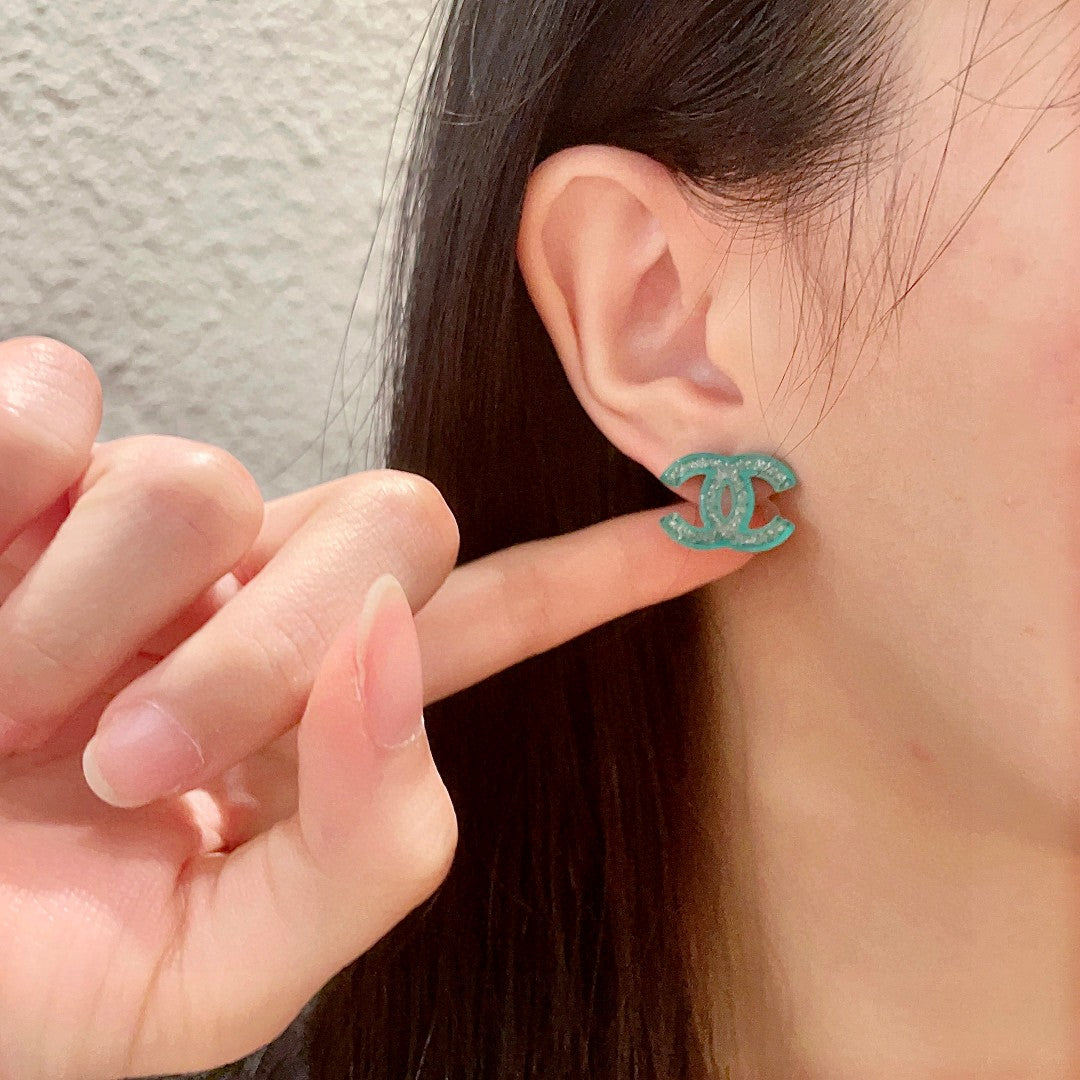 Double-C Emblem Stud Earrings in Polished Metal-Tone – Design 431 front product view