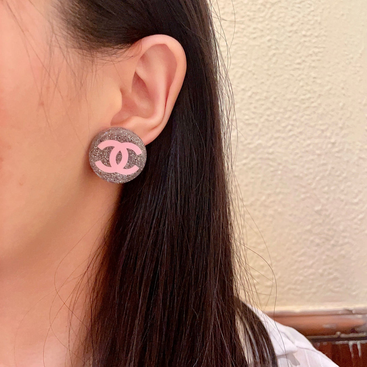 Double-C Emblem Stud Earrings in Polished Metal-Tone – Design 178 detail view