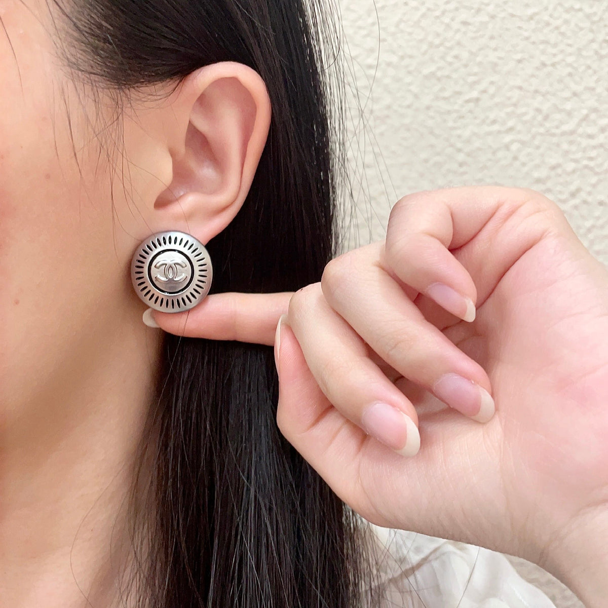 Double-C Emblem Stud Earrings in Polished Metal-Tone – Design 099 front product view