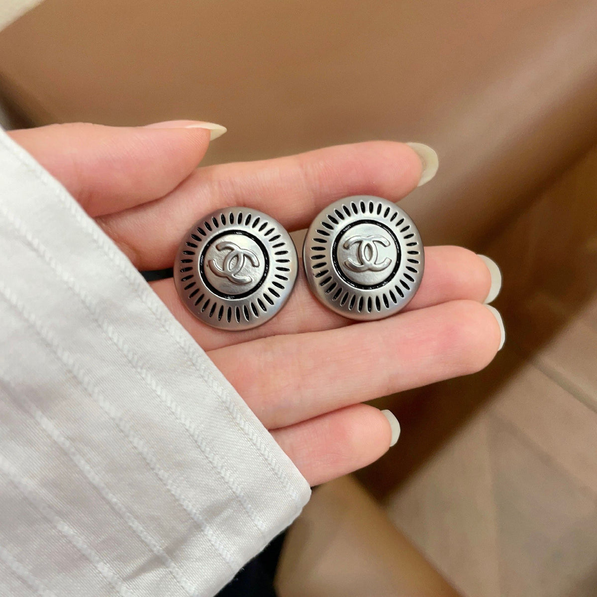 Double-C Emblem Stud Earrings in Polished Metal-Tone – Design 116 side detail