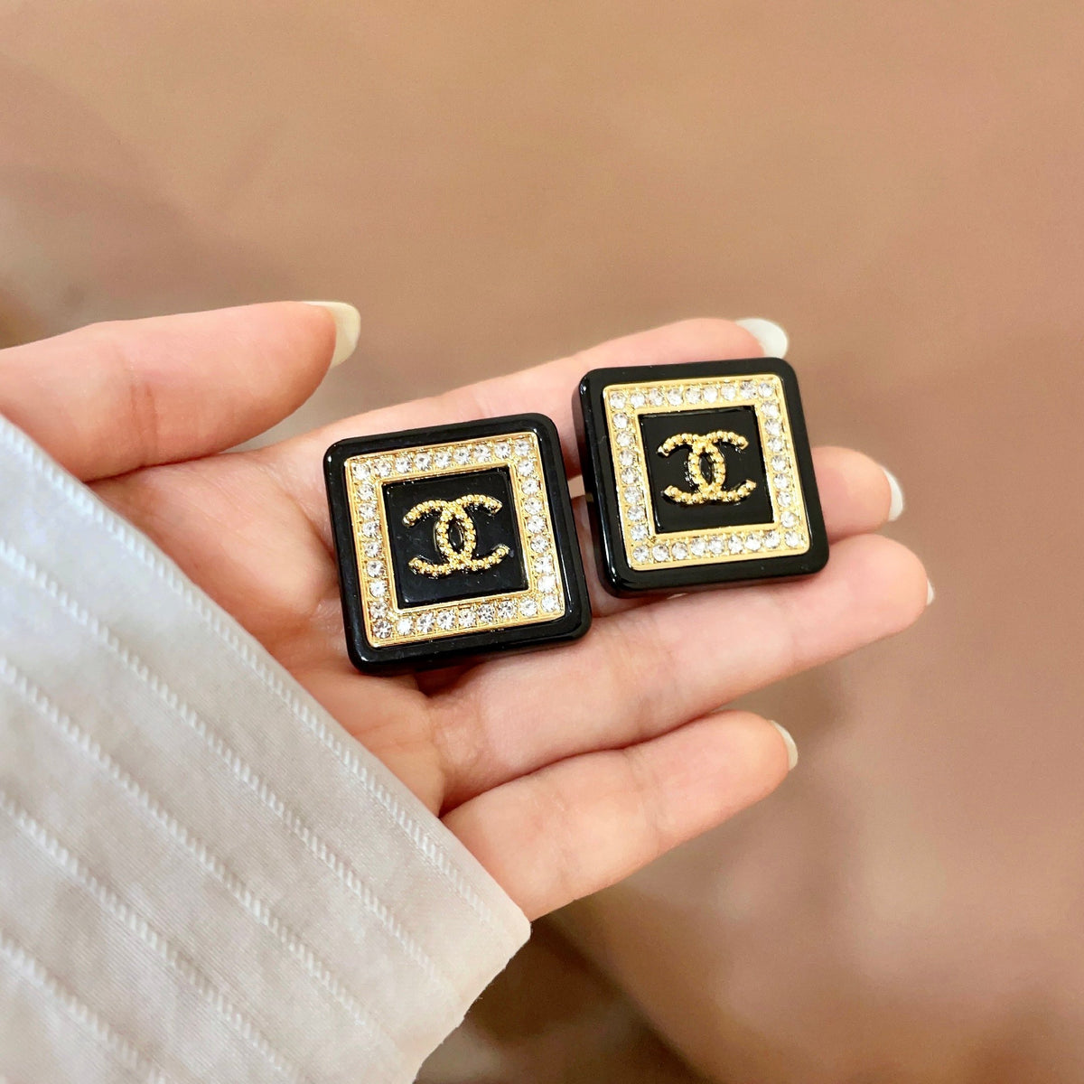 Double-C Emblem Stud Earrings in Polished Metal-Tone – Design 304 side detail
