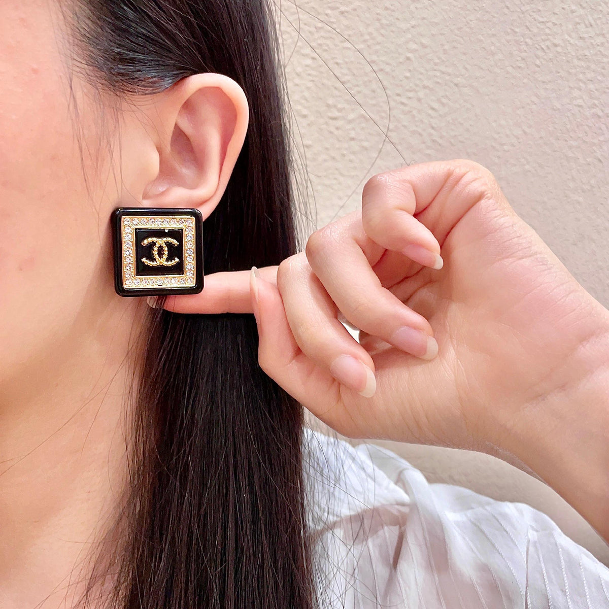 Double-C Emblem Stud Earrings in Polished Metal-Tone – Design 304 front product view
