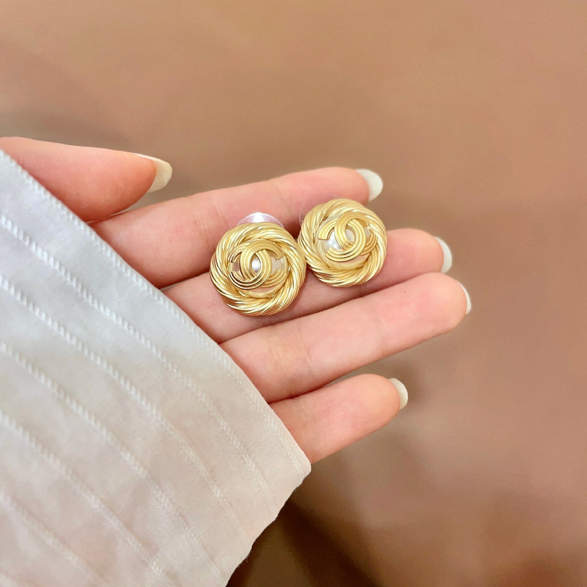 Double-C Emblem Stud Earrings in Polished Metal-Tone – Design 386 side detail