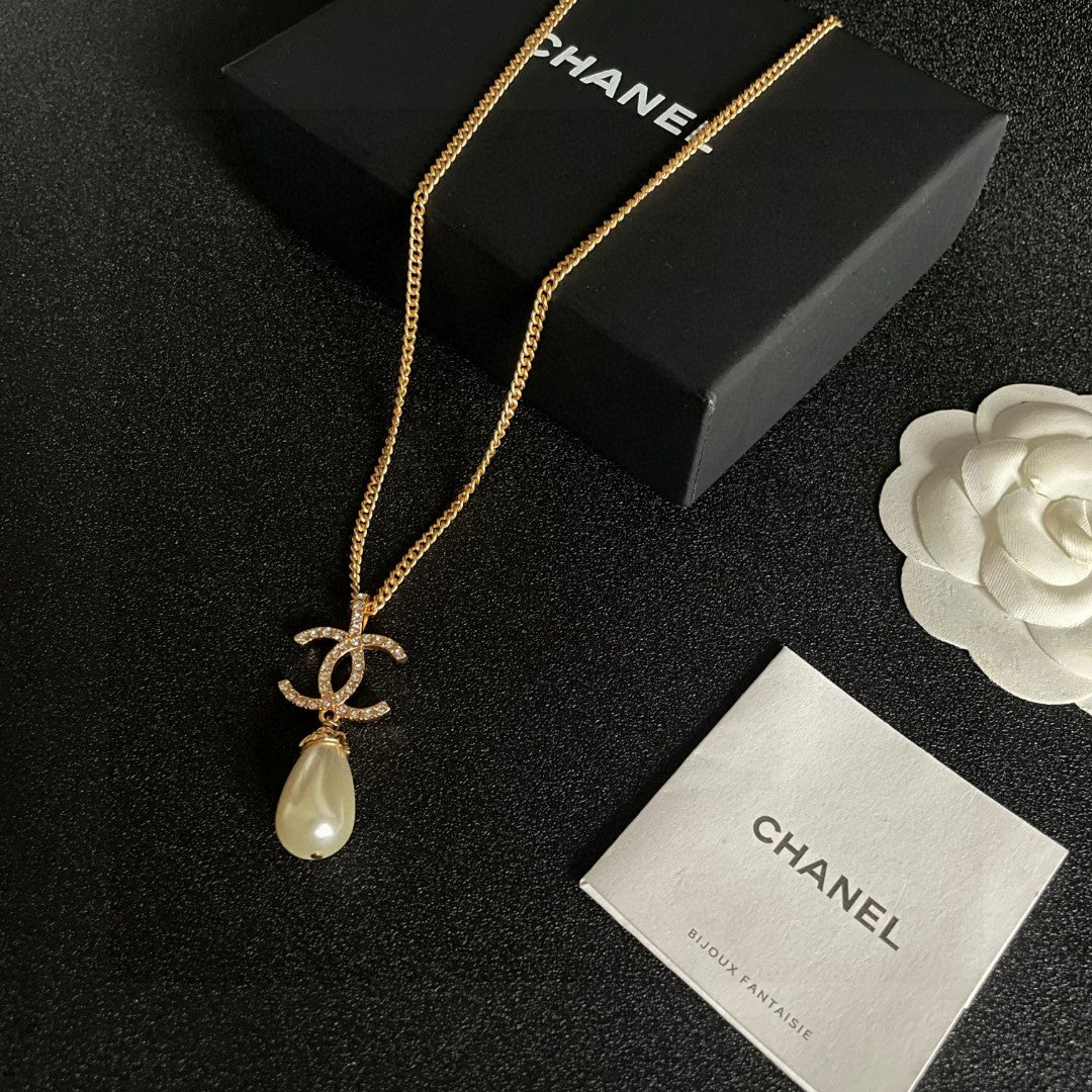 Double-C Emblem Pearl-Detail Pendant Necklace – Pearl Detail – Design 131 close-up detail